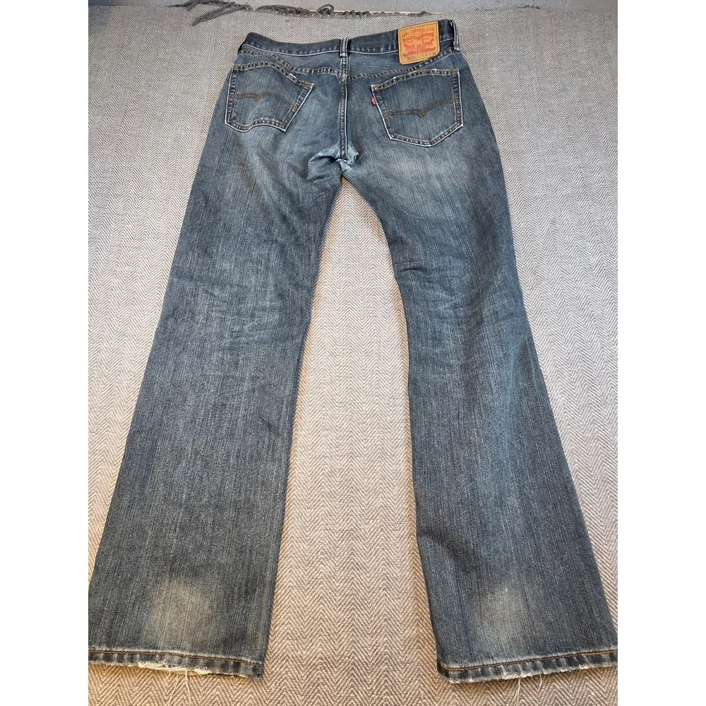 Levis 559 Relaxed Straight Jeans Mens 33x34 Medium Wash Blue Distressed Thrashed